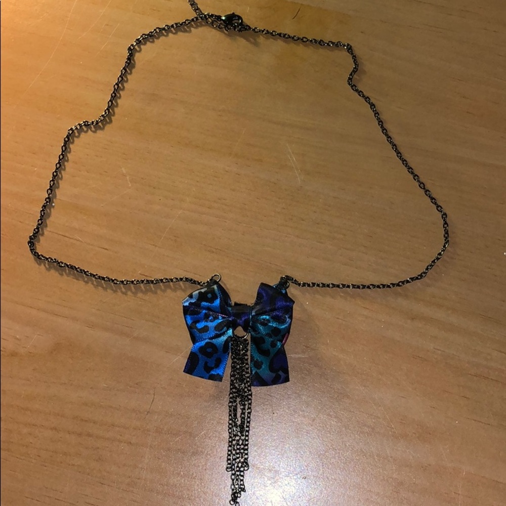 Animal print bow tie necklace